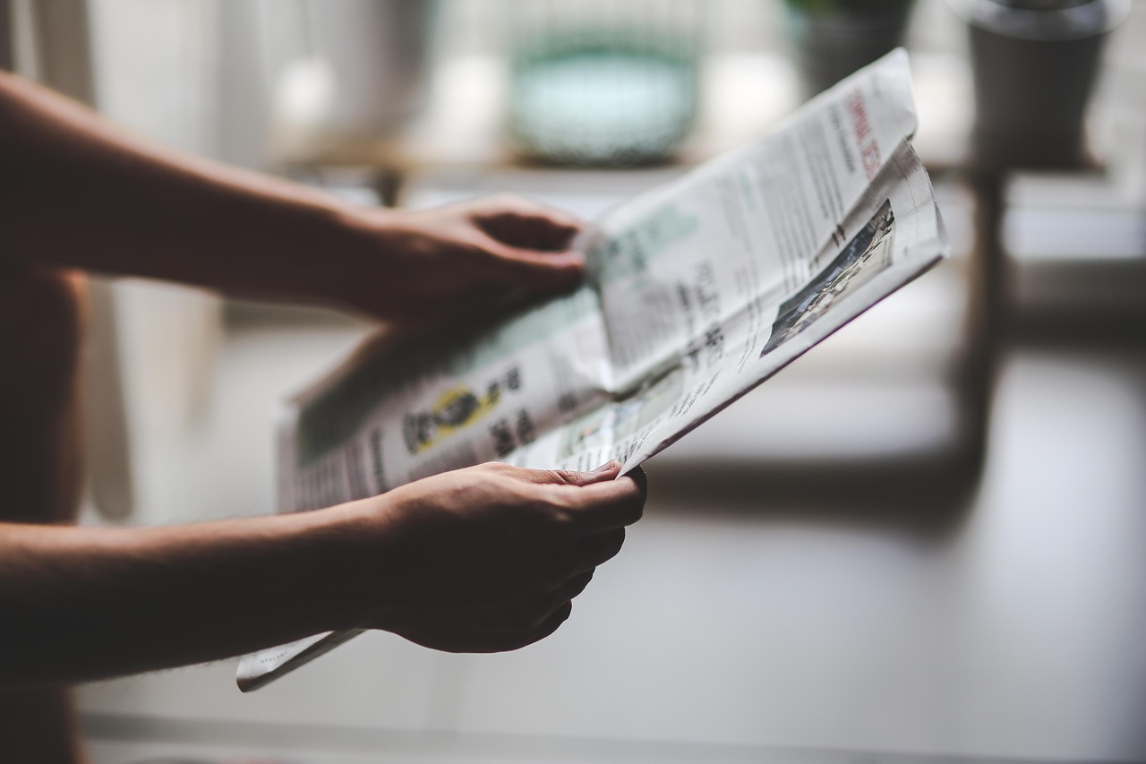 man, boy, male, read, reading, newspaper, hands, gray reading, gray newspaper, newspaper, newspaper, newspaper, newspaper, newspaper