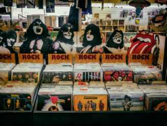 Explore a classic rock section in a vintage vinyl records shop, showcasing iconic albums and memorabilia.