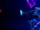 Vibrant image of a trumpeter playing during a live jazz concert, capturing the essence of musical performance.