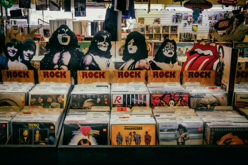 Explore a classic rock section in a vintage vinyl records shop, showcasing iconic albums and memorabilia.