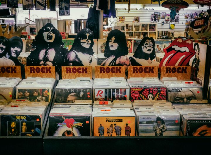 Explore a classic rock section in a vintage vinyl records shop, showcasing iconic albums and memorabilia.